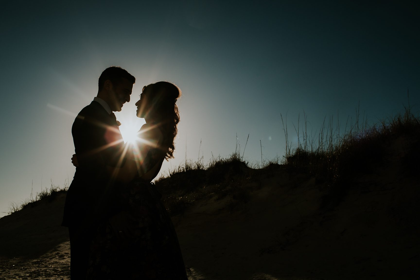 engaged couple on clearwater beach portrait