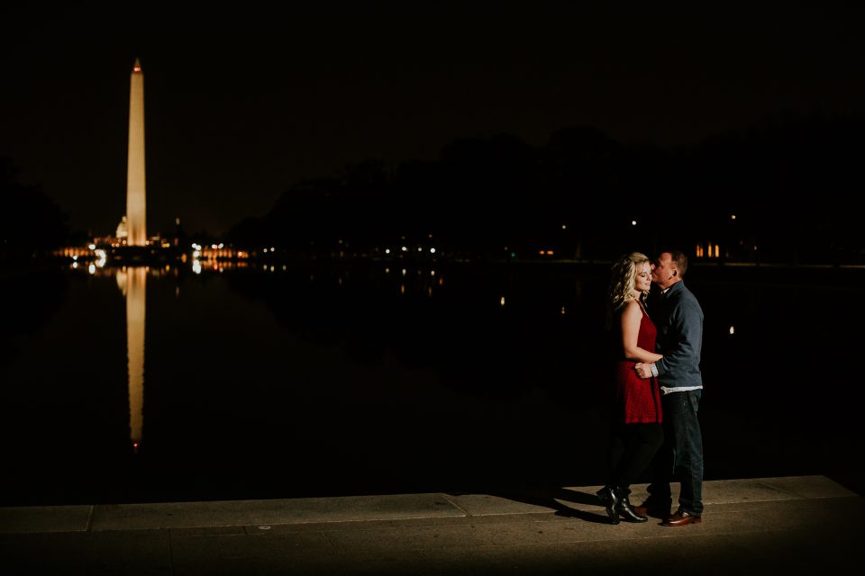 night portraits with the newly engaged couple and the washington monument